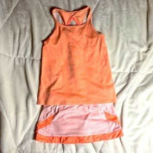 Girls Champion tennis outfit. Orange, size 6-6X.